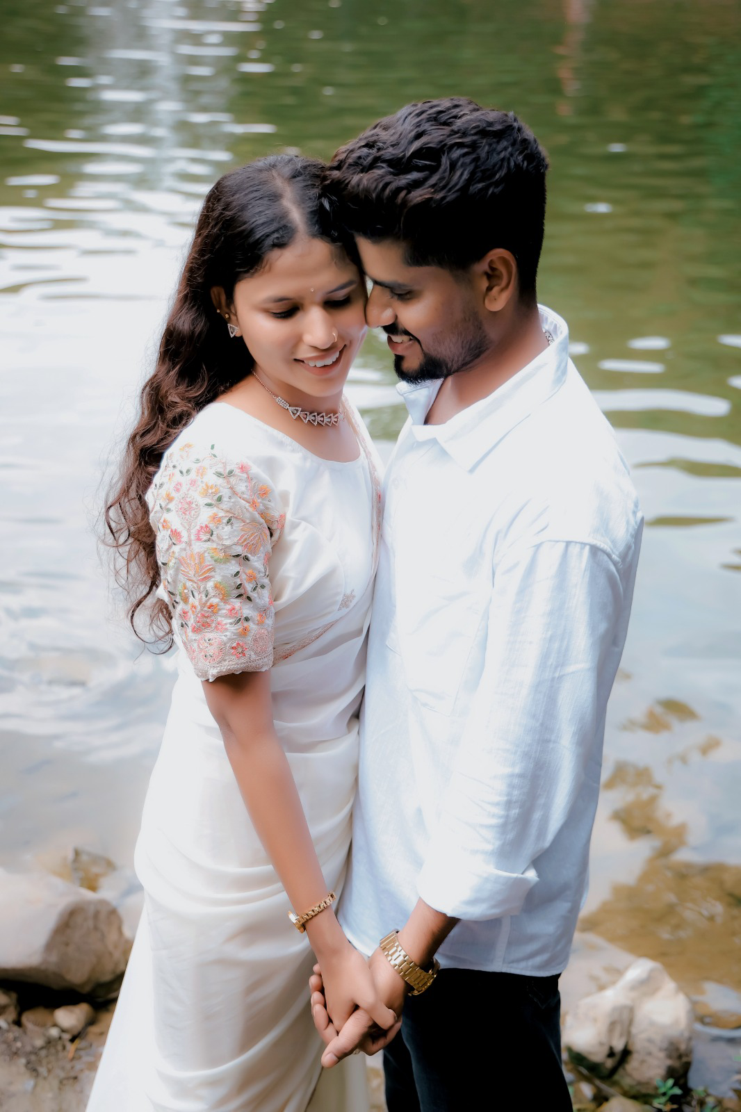Couple beside a lake during a pre-wedding shoot