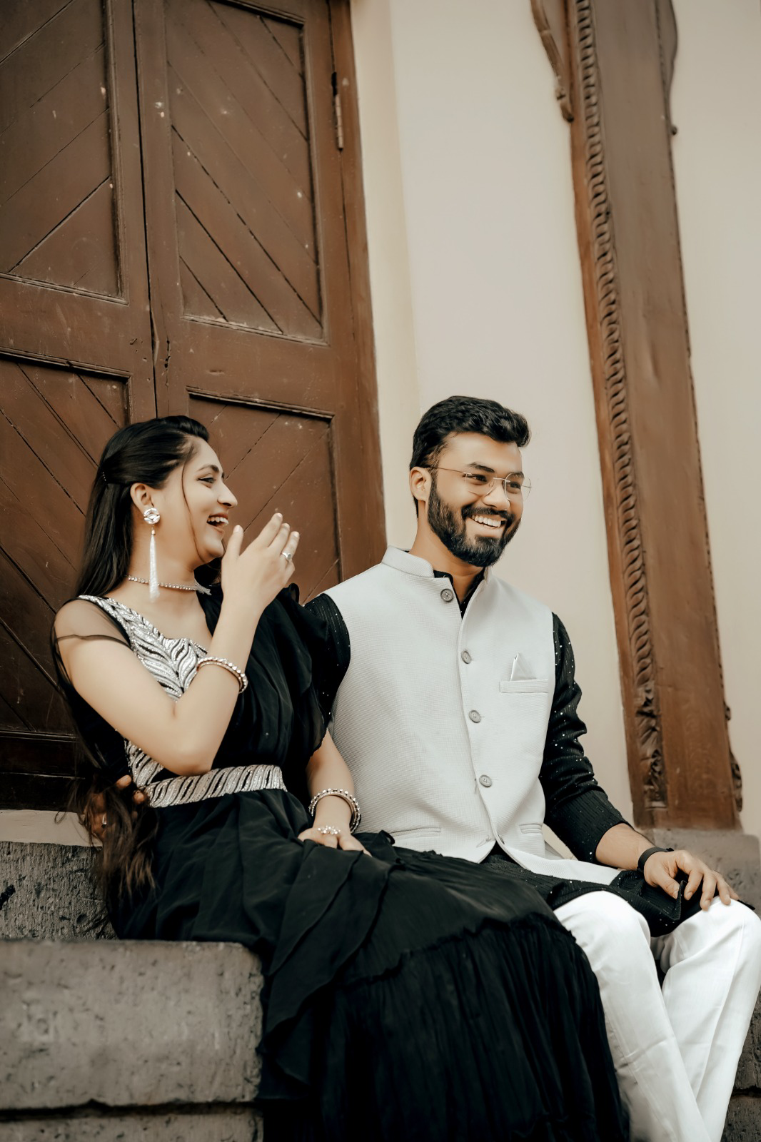 Couple posing on heritage steps during a pre-wedding shoot in Indore